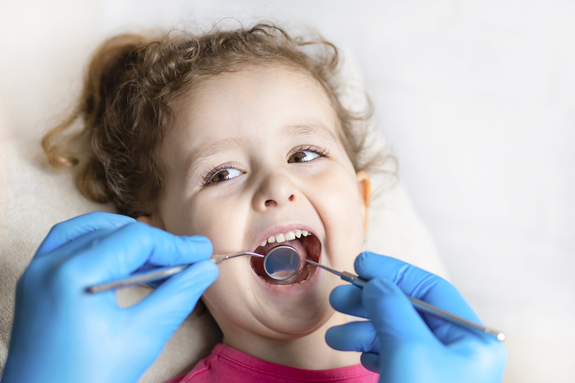 examination-treatment-teeth-children-medical-checkup-oral-cavity-with-instruments-dental-hands-child-clinic